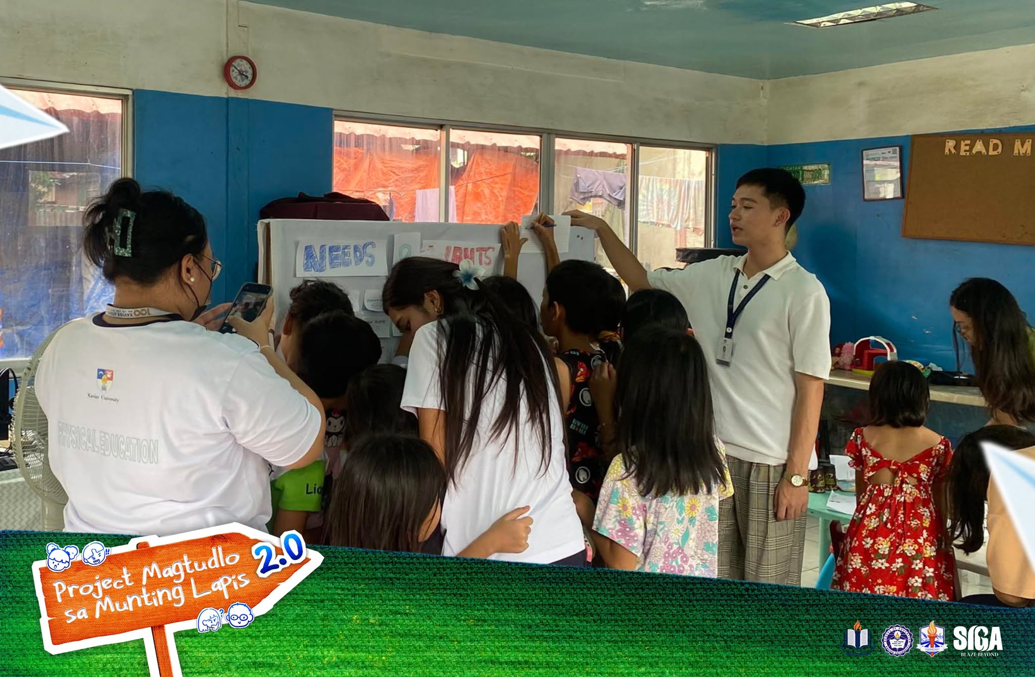 Volunteers guide children in a classroom activity